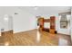 Spacious living room features wood floors and natural light from the windows at 3926 E Lavender Ln, Phoenix, AZ 85044