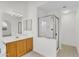 View of the vanity with a shower stall in the main bathroom at 3926 E Lavender Ln, Phoenix, AZ 85044