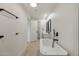 Bathroom with a soaking tub and double sink vanity at 405 E Cornell Dr, Tempe, AZ 85283