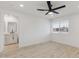 Bedroom with a new ceiling fan and light colored laminate wood floors at 405 E Cornell Dr, Tempe, AZ 85283