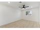Bedroom with a ceiling fan, window, and laminate wood floors at 405 E Cornell Dr, Tempe, AZ 85283