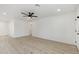 Spacious bedroom featuring a ceiling fan and light colored wood floors at 405 E Cornell Dr, Tempe, AZ 85283