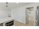 Kitchen featuring white quartz countertops and stainless steel microwave at 405 E Cornell Dr, Tempe, AZ 85283