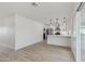 Bright kitchen featuring white cabinets and stainless steel appliances at 405 E Cornell Dr, Tempe, AZ 85283
