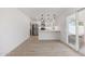 Bright kitchen featuring white cabinets and stainless steel appliances at 405 E Cornell Dr, Tempe, AZ 85283