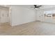 Bright and airy living room with fresh paint, modern flooring, and ample natural light at 405 E Cornell Dr, Tempe, AZ 85283