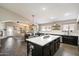 Stylish, spacious kitchen featuring an island with seating and stainless steel appliances at 420 S Dodge Dr, Chandler, AZ 85225