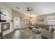 Inviting living room with a fireplace, comfortable seating, and natural light at 420 S Dodge Dr, Chandler, AZ 85225