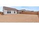 Expansive, undeveloped backyard offering a blank canvas for landscaping and outdoor living at 42405 W Peters Dr, Maricopa, AZ 85138