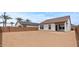Spacious backyard awaiting personalization, offering endless possibilities for outdoor enjoyment at 42405 W Peters Dr, Maricopa, AZ 85138