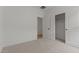 Neutral carpeted bedroom with large closet and light filled interior at 42405 W Peters Dr, Maricopa, AZ 85138