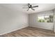 Cozy bedroom with modern ceiling fan and natural light at 4610 N 68Th St # 409, Scottsdale, AZ 85251