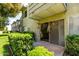 Charming apartment building showcasing sliding door, well-maintained landscaping, and verdant lawn at 4610 N 68Th St # 409, Scottsdale, AZ 85251