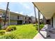 Charming apartment complex with lush green lawn and well-maintained landscaping at 4610 N 68Th St # 409, Scottsdale, AZ 85251