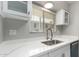 Bright kitchen featuring white marble countertops and stainless-steel appliances at 4610 N 68Th St # 409, Scottsdale, AZ 85251