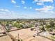 Residential aerial view highlighting the property with its pool, sport court, and spacious surroundings at 4613 E Shangri La Rd --, Phoenix, AZ 85028