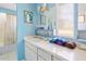 Bright bathroom with a vanity, mirror, and a shower/tub combo providing a refreshing space at 4613 E Shangri La Rd --, Phoenix, AZ 85028