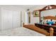 Comfortable bedroom with a wooden bed frame, dresser, and ample closet space, offering a relaxing retreat at 4613 E Shangri La Rd --, Phoenix, AZ 85028