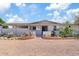 Inviting front entrance with desert landscaping and a charming brick pathway at 4613 E Shangri La Rd --, Phoenix, AZ 85028