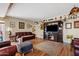 Comfortable living room with a large TV, wooden accents, and plush seating for relaxing and entertaining at 4613 E Shangri La Rd --, Phoenix, AZ 85028