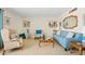 Cozy living room with stylish furniture and a decorative gold mirror at 4613 E Shangri La Rd --, Phoenix, AZ 85028