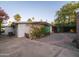 Spacious backyard featuring decorative pergola, plants, and a gravel walkway at 4620 N 38Th Dr, Phoenix, AZ 85019