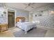 Cozy bedroom with patterned wallpaper, closet access, and plush carpeting at 4620 N 38Th Dr, Phoenix, AZ 85019