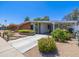 Charming single-story home with desert landscaping, covered carport and extended driveway at 4620 N 38Th Dr, Phoenix, AZ 85019