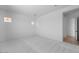 A bright and spacious bedroom with carpet flooring, neutral tones, and minimal decor at 5311 N 88Th Ave, Glendale, AZ 85305