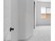 Bright bedroom with neutral carpeting and a partial view of the closet at 5311 N 88Th Ave, Glendale, AZ 85305