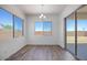 Dining room features large windows and sliding glass doors to a nice outdoor space at 5311 N 88Th Ave, Glendale, AZ 85305