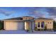 Beautiful single-story home with a two-car garage and decorative brick accents at 5311 N 88Th Ave, Glendale, AZ 85305