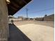 View of the backyard patio area from underneath a covered porch at 5815 N 21St Ave, Phoenix, AZ 85015