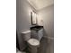 Bathroom featuring a modern vanity with vessel sink, wood-look floors, and updated fixtures at 5815 N 21St Ave, Phoenix, AZ 85015