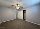 Bedroom featuring neutral walls and carpet and open closet at 5815 N 21St Ave, Phoenix, AZ 85015