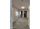 Hallway featuring hard flooring and doors to rooms at 5815 N 21St Ave, Phoenix, AZ 85015