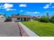 Aerial view of spacious backyard with lush lawn, patio, and privacy fence at 6160 E Inglewood St, Mesa, AZ 85205