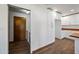 Laundry room with white cabinets and access to washer and dryer at 6160 E Inglewood St, Mesa, AZ 85205