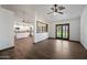 Spacious living area showcasing wood-look floors and an open floor plan concept at 6160 E Inglewood St, Mesa, AZ 85205