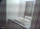 Bathroom featuring a white, modern sink on a marble countertop at 720 S Dobson Rd # 95, Mesa, AZ 85202