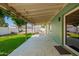 Relaxing back patio with full view of the well-manicured backyard at 810 W Villa Maria Dr, Phoenix, AZ 85023