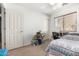 Bedroom featuring a sewing desk, carpet floors and plenty of natural light at 829 S 111Th Dr, Avondale, AZ 85323
