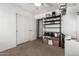 Bedroom featuring carpet floors, closet and shelving unit for optimal storage at 829 S 111Th Dr, Avondale, AZ 85323