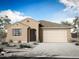 Charming single-story home featuring a tile roof, neutral stucco, an attached garage, and desert landscaping at 848 W Riparian Dr, San Tan Valley, AZ 85140