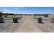 Gravel walking path with landscaped entrance, connecting residents to common areas and amenities at 848 W Riparian Dr, San Tan Valley, AZ 85140