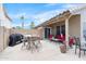Back patio with ample seating, and a clear view of the well-maintained backyard space at 8948 W Fargo Dr, Peoria, AZ 85382