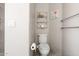 Cozy bathroom featuring white toilet and unique wall-mounted fixtures at 8948 W Fargo Dr, Peoria, AZ 85382