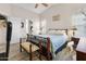 Well-lit bedroom with a double bed, side tables, and ample space at 8948 W Fargo Dr, Peoria, AZ 85382