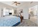 Comfortable bedroom with office space and access to closet and bathroom at 8948 W Fargo Dr, Peoria, AZ 85382