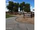 Arrowhead Shores Park entrance with lush trees, playground, and picnic area visible at 8948 W Fargo Dr, Peoria, AZ 85382